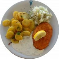 Hähnchenschnitte 'Diana' mit Brokkoli-Käse-Füllung und Zitronenecke (19,21,54,81) mit Bärlauch-Dip (19) dazu Bratkartoffeln und kleine Salatgarnitur (9)