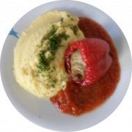 Rote Paprikaschote mit Gemüsefüllung (21,22,81) mit 'Sauce a la Mancha' Paprika-Knoblauch-Soße (19,49) dazu hausgemachter Kartoffelstampf (18)