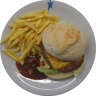 'Americans Best' Burger mit Bacon, Cheddar und BBQ Sauce (1,2,3,11,19,21,22,24,48,51,52,62,81,83) dazu Homestyle Fries