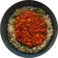 'Chili sin Carne' (auch extra scharf) mit Sojagehacktem, Mais, Kidneybohnen und Paprika dazu Kräuterreis (2,18,49,81)