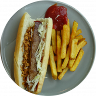 Hot Dog mit Räuchertofu, Gewürzgurke, Röstzwiebeln, Senf und Mayonnaise (1,2,3,9,18,21,22,81) dazu als Menüoption: frittierte Kartoffelspezialitäten