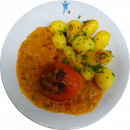 Rote Paprikaschote mit Gemüsefüllung (21,22,81) mit 'Sauce a la Mancha' Paprika-Knoblauch-Soße (18,49) dazu Schwenkkartoffeln (3,24) 