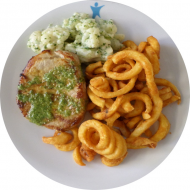 Mariniertes Schweinerückensteak 'Pesto' (15,19,49,51) dazu Kartoffelwedges und Salatgarnitur