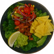 Bunte Taco-Bowl 'Al Pastor' mit Schweinefleischstreifen, Tortillachips, Avocado und Kirschtomaten (3,51,81)