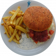 Burger 'Chicken Lemon-Pepper' mit gegrillter Hähnchenbrust, Balsamico-Mango-Chutney und Eisbergsalat (1,19,24,81) dazu Amazing Fries