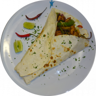  'Fajita Pava' mit saftigen Putenstreifen, gebratener Paprika, Limette und Schmand (19,49,54,81)