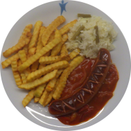 Grillwurst (1,2,3,8,46,51) mit Paprika-Letscho-Soße (3,9,22,81) dazu Pommes frites und Salatgarnitur 