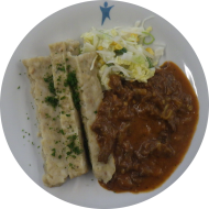 'Boeuf Stroganoff' mit Champignons und saurer Sahne (9,19,22,52,62,63,81) und hausgemachte Semmelknödel (15,19,62,81) dazu Salatgarnitur