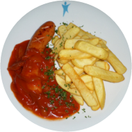 Grillwurst (1,2,3,8,46,51) mit Paprika-Letschosoße (3,9,22,81), dazu Pommes frites und frisches Obst