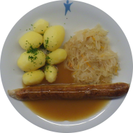 Jackfruit Bratwurst (18,21) an Bratenjus (81) dazu Sauerkraut ohne Speck und Petersilienkartoffeln
