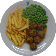 7 Gemüse-Köttbullar (15) an Bratenjus (81) dazu Erbsengemüse (19) und Pommes frites