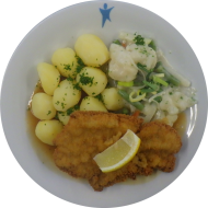 Marienfelder Schweineschnitzel mit Zitronenecke (15,51,81) an Bratenjus (81) dazu buntes Rahmgemüse (18,81) und Petersilienkartoffeln