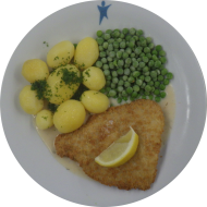 Gebackenes Schollenfilet mit Zitronenkeil (16,56,81,82) an Dill-Weißwein-Rahmsoße (1,19,22,24,44,81) mit Erbsengemüse und Petersilienkartoffeln