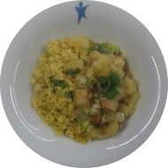 Kleine Portion: Tofupfanne 'süß-sauer' mit Ananas und Frühlingszwiebel (2,18,49,81) dazu Zitronenbulgur (81)