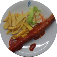 Currywurst 'Hot & Sweet' an 2erlei Saucen (2,3,9,51,52) und Steakhouse Pommes dazu Salatgarnitur
