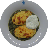 Gebackene Ofenkartoffel auf Rahmspinat mit Kräuterquark und Käse (1,19,81)