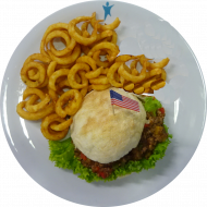Burger 'Americans Best' mit Bacon, BBQ Sauce und Cheddar (1,2,3,11,19,21,22,24,48,51,52, 81,83) dazu Twister Pommes (81)