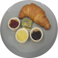 Frühstück in der Cafete: 'Pariser Frühstück' mit Croissant und Marmelade (15,18,19,81,82) dazu 1 Heißgetränk 0,2l 