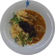 Kleine Portion: Puten-Tajine mit Mandeln und Backpflaumen-Topping (2,19,49,54,71) dazu Couscous orientalischer Art (71,81)