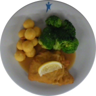 Hähnchenschnitzel 'Cordon Bleu' mit Zitronenecke (2,8,19,81) und Geflügelsoße (81) dazu Pommes Noisette (15) und Brokkoligemüse