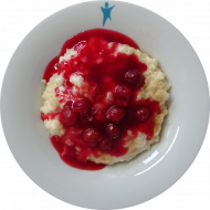 Milchreis dazu Sauerkirschen mit Zimt und Zucker (19). Auch als kleine Portion erhältlich.