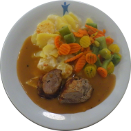 Schweinemedaillons in Rosmarin-Oregano-Olivenöl-Marinade an Bratenrahmsoße (19,81) dazu feine Gemüsemischung und hausgemachtes Kartoffelgratin (15,19,81)