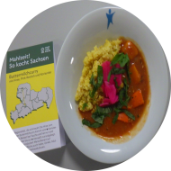 Buttermilch-Curry mit Hokkaido und Tomaten (19,22) dazu Hirse und Pink Rettich Garnitur (24)
