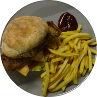 Burger 'BBQ Rib' mit hausgemachten Tortilla Chips, Senfgurken-Relish und Salat (3,9,15,21,22,81,82) dazu als Menüoption Pommes und House-Dip (9,22)