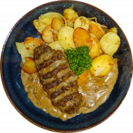 Hausgemachtes gebratenes Hacksteak(15,22,81) dazu Kräuter-Bratkartoffeln mit Champignonrahmsoße (1,3,19,22,24,81)