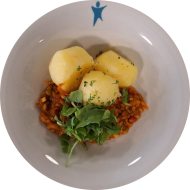 Kleine Portion: Grünkernragout mit Tomate und Rucola (49,81,85) dazu Petersilienkartoffeln