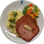 Gebratener Wiegebraten mit Senf (2,3,8,21,22) an Bratensoße (81) dazu Mischgemüse und hausgemachter Kartoffelpürree (19)
