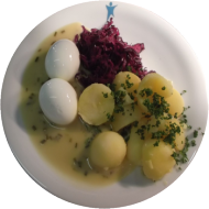 2 gekochte Eier mit würziger Senfsoße, Rotkrautrohkost und Petersilienkartoffeln (9,15,19,22,81) 