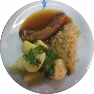 Sächsische Rostbratwurst mit deftigem Sauerkraut an würziger Bratensoße dazu Petersilienkartoffeln (3, 4, 19, 21, 22, 51, 81)