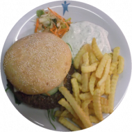 Campus-Riesenburger mit Rinderhacksteak, Käse, Salat und Dressing dazu dicke Pommes (2, 3, 15, 19, 21, 22, 23, 52, 81, 83)