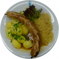 Roster mit Bratenjus oder Grützwurst mit deftigem Sauerkraut und Petersilienkartoffeln (2,3,4,19,22,51,52,54,81)