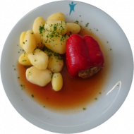 Rote Paprikaschote mit Hackfleischfüllung (15,51,81), Bratenjus (81), Kartoffeln, frisches Obst