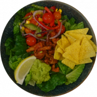 Bunte Taco-Bowl 'al Pastor' mit marinierten Schweinestreifen oder mariniertem Tofu, Tortillachips, Kirschtomaten, Avocado (3,21,51,81) 