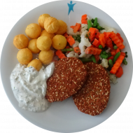 2 Grünkern-Käse-Medaillon (15,18,19,21,23,81,85) mit Kräuter-Quark-Dip (19) dazu provenzialische Gemüsemischung und Pomme Noisette (unpanierte Kartoffelbällchen) (15)