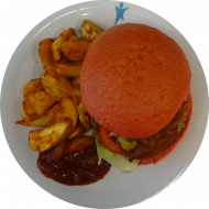 Texasburger mit Salat, Tomate, Gurke und BBQ-Sauce (1,2,4,8,21,22,51,52,81), dazu Currywedges (49,81)
